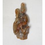 A Chinese carved agate group of Guanyin with a phoenix, 19th century, 17cm high