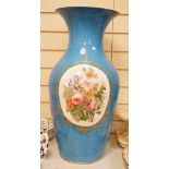 A large 19th century Sevres style blue porcelain decorated vase, 65cm (a.f.)