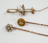 An early 20th century 9ct and gem set bug brooch, 34mm and two yellow metal stick pins, diamond