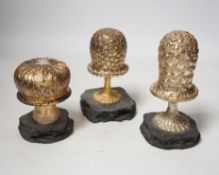 Three Elizabeth II limited edition surprise toadstools, by Christopher Nigel Lawrence, opening to