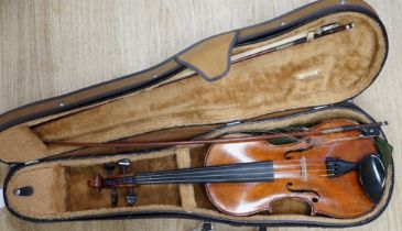 A cased 19th century German violin with paper label for August Hensel, length of body, 36cm, with