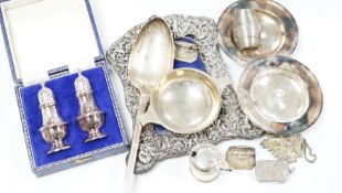 A quantity of silver items including a late Victorian repousse photograph frame, William Comyns,