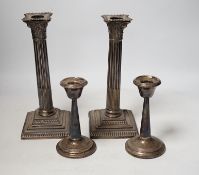 A pair of late Victorian silver Corinthian column candlesticks, Hawksworth, Eyre & Co, Sheffield