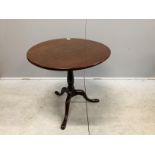 A George III mahogany tilt top tripod tea table, diameter 74cm, height 68cm