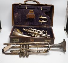 A cased Hawkes & Son cornet, bell engraved with ‘Excelsior Soncrous Class A’ and an ‘American