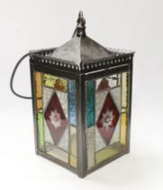 A stained glass panelled hanging lantern
