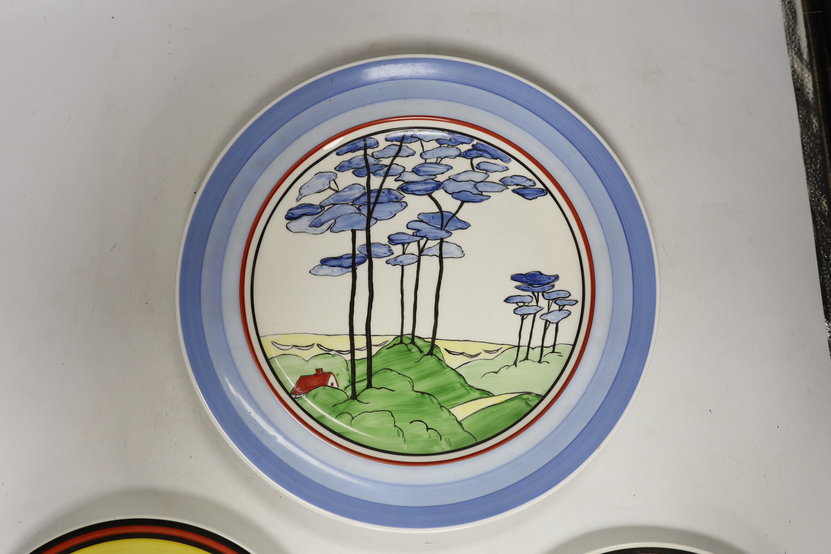 Four Clarice Cliff style plates, a similar vase and a jar and cover, tallest 31cm - Image 7 of 7
