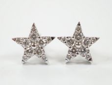 A modern pair of 18ct white gold and diamond chip star shaped ear studs, 10mm, gross weight 2.2