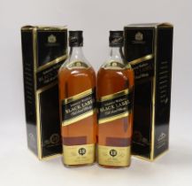 Two bottles of Johnnie Walker 12 year extra special Black Label whisky