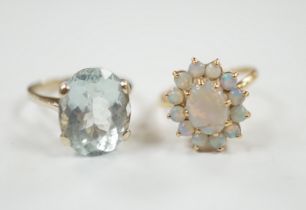 A 14k yellow metal and white opal set oval cluster ring, size P/Q, gross weight 4.1 grams and a gilt