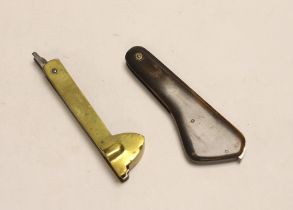 An unusual early 19th century brass multi tooled (6 tools) Fleam and another Fleam with horn handle