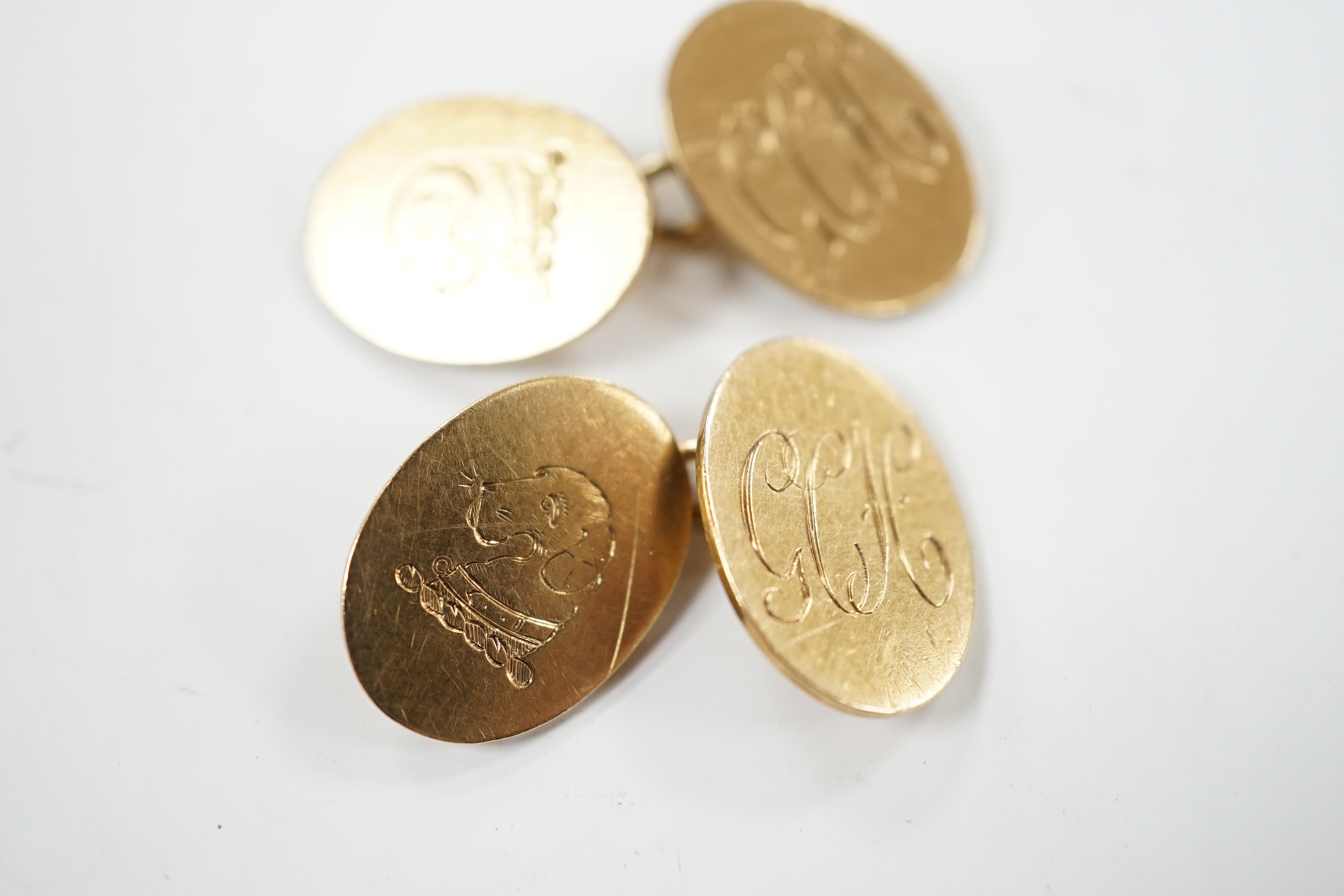 A pair of early 1960's 9ct gold oval cufflinks, with engraved crest and monogram, 10.3 grams. - Image 7 of 10