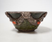 A Tibetan silver cup and a silver mounted hard stone bowl