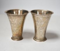 Two 19th century Swedish white metal beakers, of tapering form, one with maker's mark Seseman,