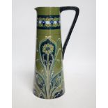 An early Moorcroft Macintyre Florian ware jug, 28cm high