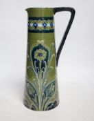 An early Moorcroft Macintyre Florian ware jug, 28cm high