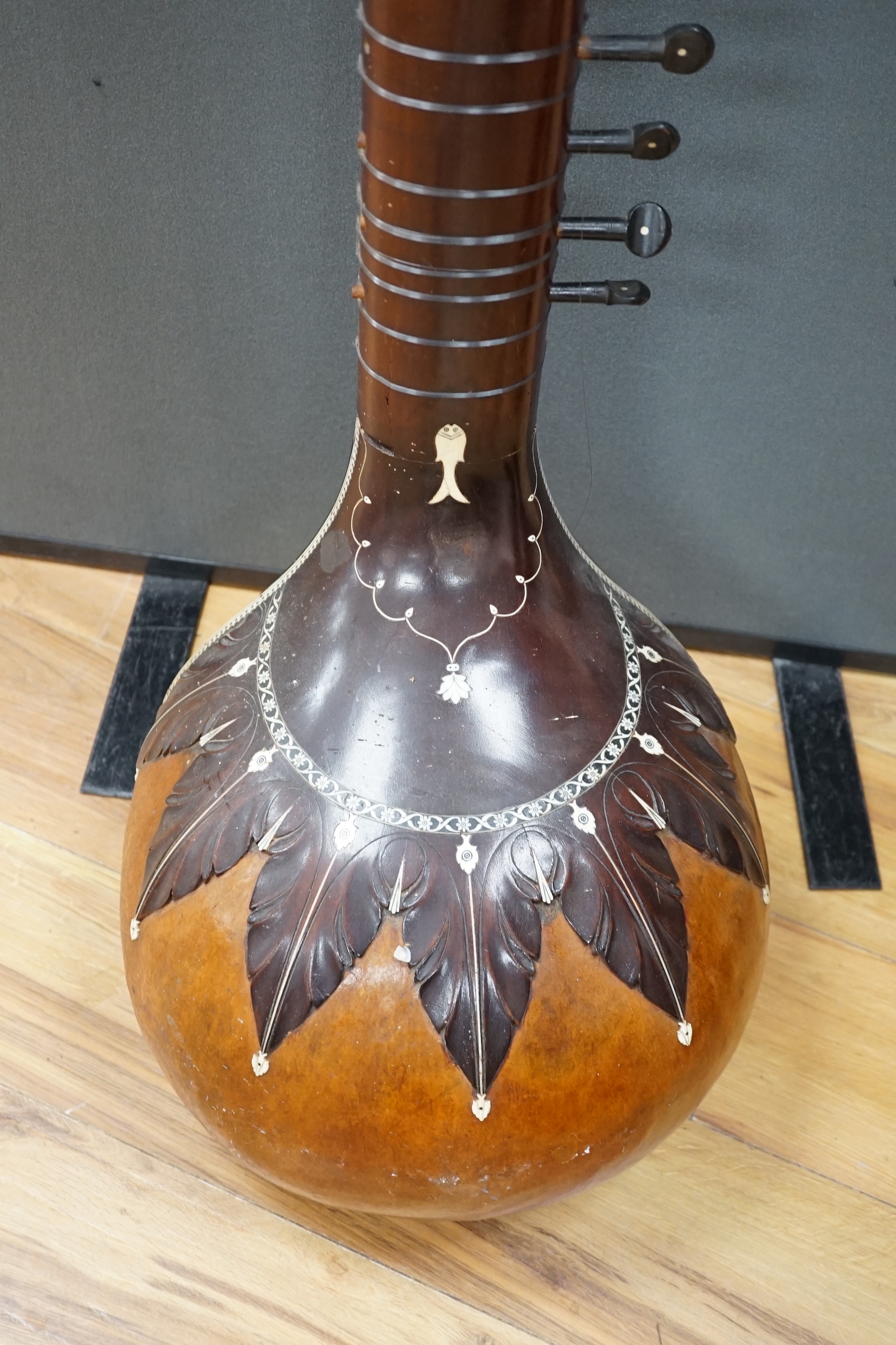 An Indian sitar, with ivory bridge and decoration, inlaid with ‘Harbhajan Grewal’ overall length - Image 6 of 7