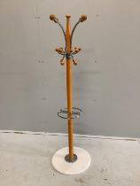 A mid century low coat and stick stand, height 129cm