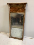 A Regency giltwood and composition pier glass with painted landscape tablet, width 46cm, height