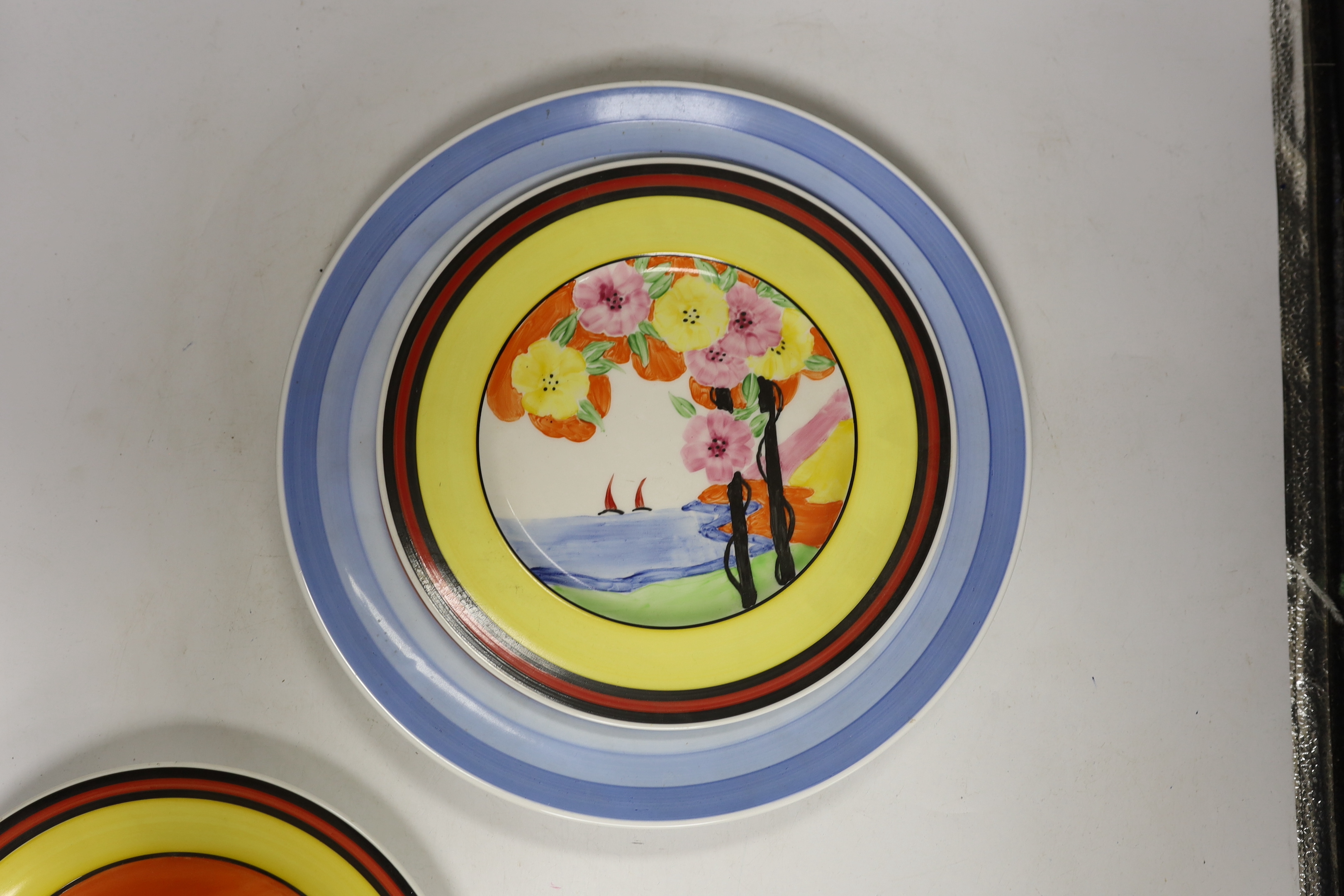 Four Clarice Cliff style plates, a similar vase and a jar and cover, tallest 31cm - Image 6 of 7
