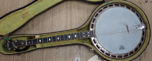 A cased 1920s Ludwig 'Kingston', USA tenor four string banjo, inlaid back, mother of pearl inlay