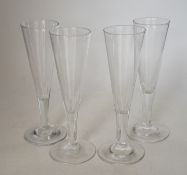 A set of eight cut glass champagne flutes, 18cm