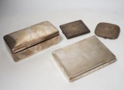 A 1930's engine turned silver cigarette box, 16.6cm, an Edwardian silver cigarette box and two