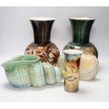 Two pottery vases a lustre vase and two shorter shell vases, tallest 27cm high