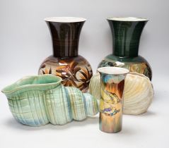 Two pottery vases a lustre vase and two shorter shell vases, tallest 27cm high