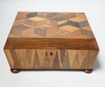 A Victorian specimen wood perspective cube parquetry workbox and contents, 22cm