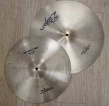 Four Zildjian drum kit cymbals; a 14” Top Quick Beat Hi-hat pair, a 16” Medium Thin Crash, an 18”