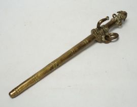 A Tibetan bronze goat tether, 39cm high