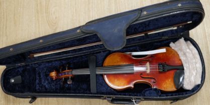 A cased fine French half size violin, Mirecourt, length of body 31.5cm with a bow and case, CITES