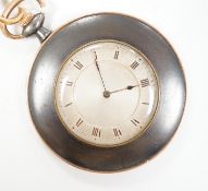 A gun metal and yellow metal dress pocket watch, on a white metal and seed pearl set chain, with