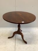 A George III mahogany tilt top tripod tea table, diameter 82cm, height 77cm
