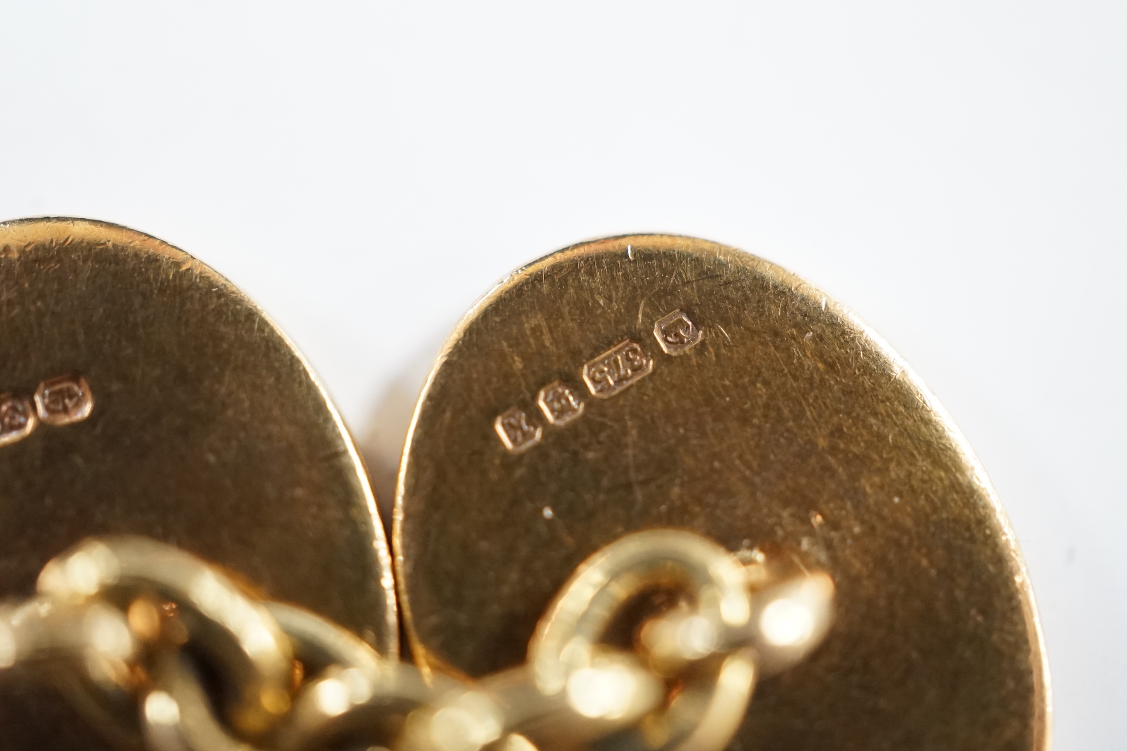 A pair of early 1960's 9ct gold oval cufflinks, with engraved crest and monogram, 10.3 grams. - Image 9 of 10