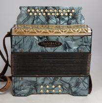 A cased German Herfeld & Co. Neuenrade accordion, rescued from a supply ship to the battleship