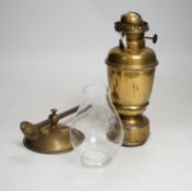 A pair of brass ship design lanterns with glass shades