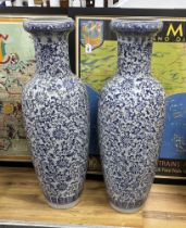 A pair of large Chinese blue and white vases, 107cm high