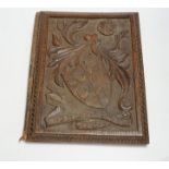 A late 19th century carved oak ink blotter with motto ‘Non Aliunde Pendere’ 38cm high