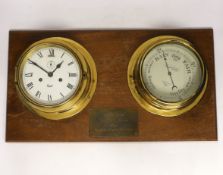 A brass mounted barometer and bulkhead clock with presentation plaque, 56cm wide