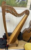 A modern Welsh Teifi Telynau harp, 36 string harp with maple sound board, carved maker’s mark