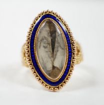 A 19th century 15ct and blue enamel set navette shaped mourning ring, with damaged inset