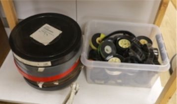 A collection of cinema projectionist's film reels, trailers for films, etc. titles including Notting