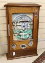 A 1950s Wondermatics Allwin penny slot machine, 'Win and Place' pin ball machine in oak case, 79 x