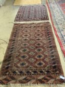 Two antique Tekke / Bokhara red ground rugs, larger 176cm x 107cm