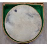 An Irish Bodhran drum with Celtic decorated plywood frame and goat skin, diameter 46cm, in fitted