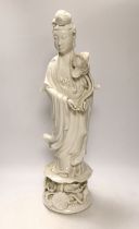 A large 20th century Chinese Blanc de Chine figure of Guanyin, 56cm