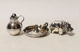 A modern silver miniature model of a hippopotamus, a white metal 'Guernsey can' pepperette and a
