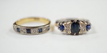 A George V 18ct white gold, sapphire and diamond cluster set ring, size K and one other 18ct,